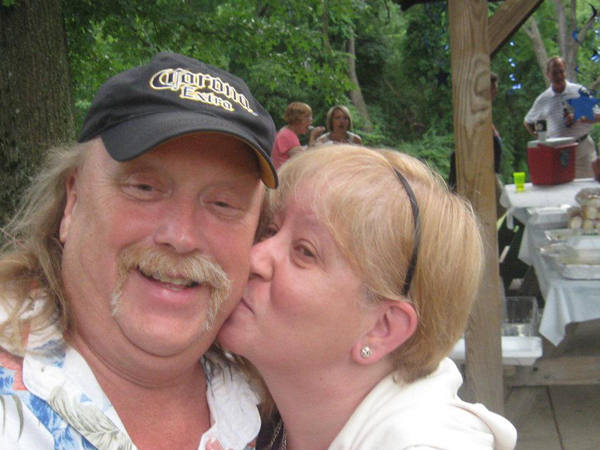 Mark Beatty receiving a little sugar from Lindarae Schmidt (Imhoff).